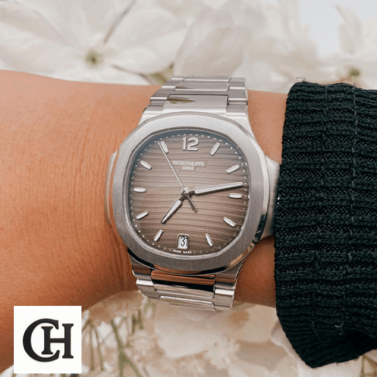 Patek Philippe Nautilus 7118/1A "Smoke Gray Dial" Premium Edition patek philippe nautilus 71181A 011 hand Patek Philippe Nautilus Stainless Steel Grey Dial 71181A-011 on the wrist
