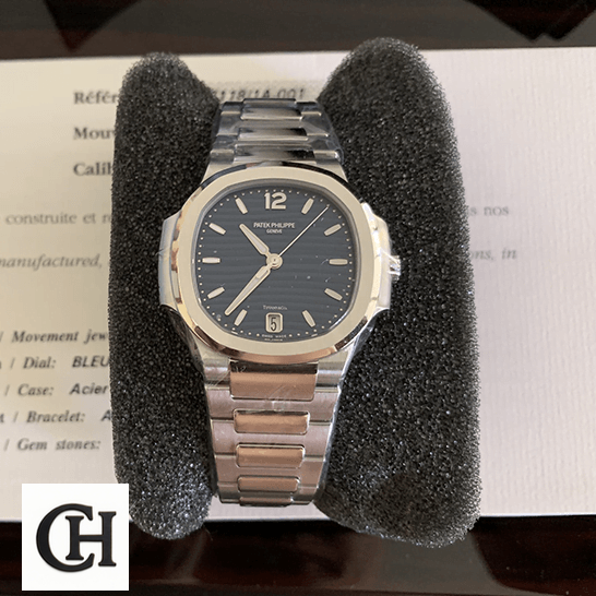Patek Philippe Nautilus 7118/1A Ladies Perfect Duplicate patekphilippe nautilus 71181A 001 alpha Patek Philippe Nautilus 71181A-001 Blue Dial on the black stand