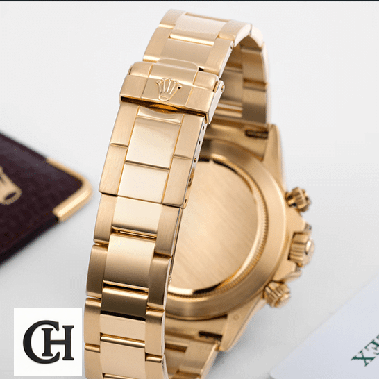 Rolex Daytona 116523 Yellow Gold Oyster Bracelet on the Rolex Logo