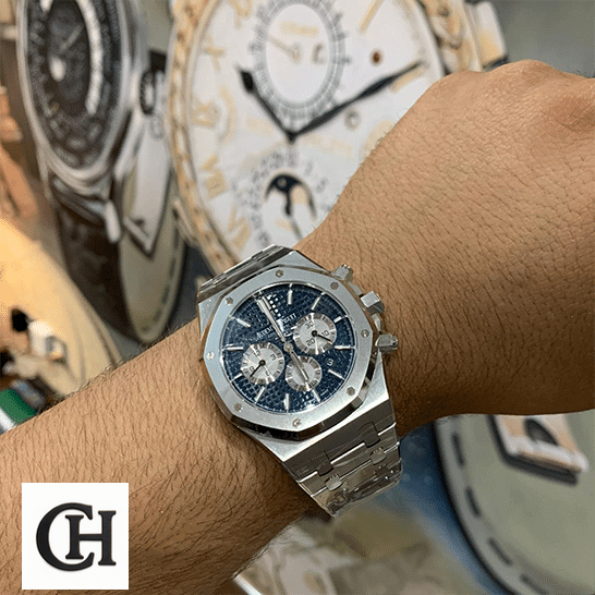 AP Royal Oak Chronograph 26331ST Supreme audemars piguet royal oak blue dial 26331ST.OO.1220ST Audemars Piguet Stainless Steel Blue Dial on the man wrist watch background