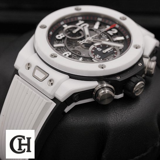 Hublot Big Bang Unico Hublot Big Bang Black Dial White Rubber Bracelet on the black stand
