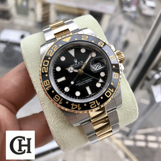 Rolex GMT-Master II 126711CHNR Rolex GMT-Master II 116713 dial is black with stick and dot indices