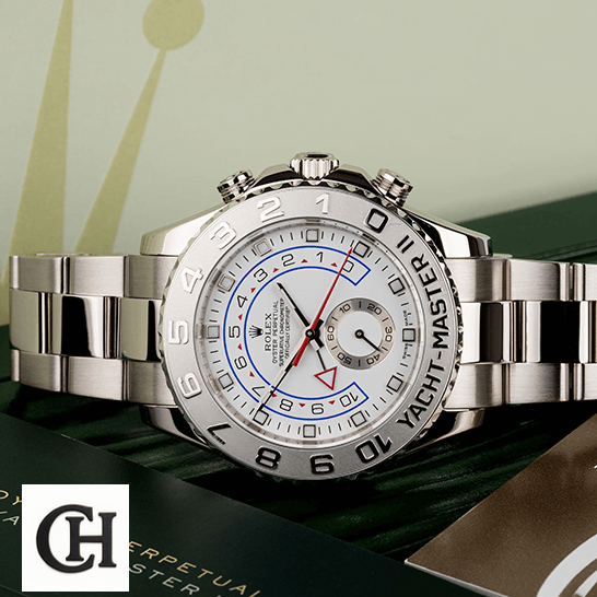 Rolex Yacht-Master II 116689 White Gold Master rolex yacht master 116689 0001 tiltedleft Rolex Yatch Master 116689-0001 White Dial next to warranty card