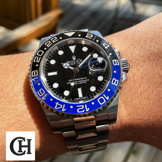 Rolex GMT-Master II 116710BLNR Rolex GMT-Master II Black Dial Batman Bezel 116710BLNR on his arm