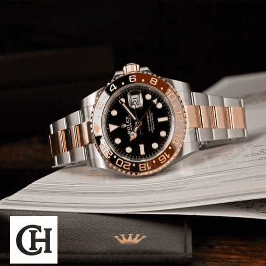 Rolex GMT-Master II 126711CHNR "Root Beer" Deluxe Quality Rolex GMT-Master II Black Dial 126711CHNR-0002 on the book