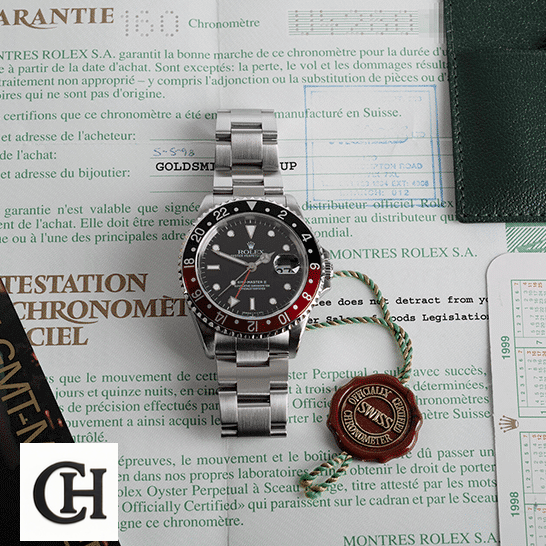 Rolex GMT-Master II 16710 Rolex GMT-Master II Coke 16710 Black & Red Bezel on the warranty certificate