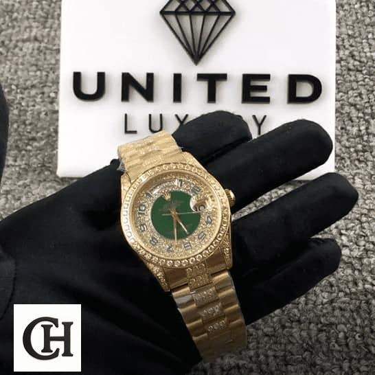Rolex Day-Date 118348 Rolex Datejust 118348 yellow gold color and a gem-set bezel