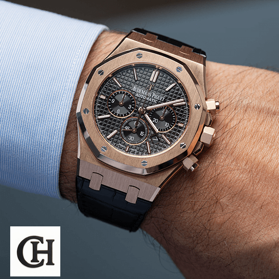 Audemars Piguet Royal Oak Chronograph 26320OR Audemars Piguet Royal Oak Black Dial Gold Case on the man wrist
