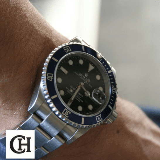 Rolex Submariner Date 16610 S.Steel Oyster Bracelet Black Dial on his arm