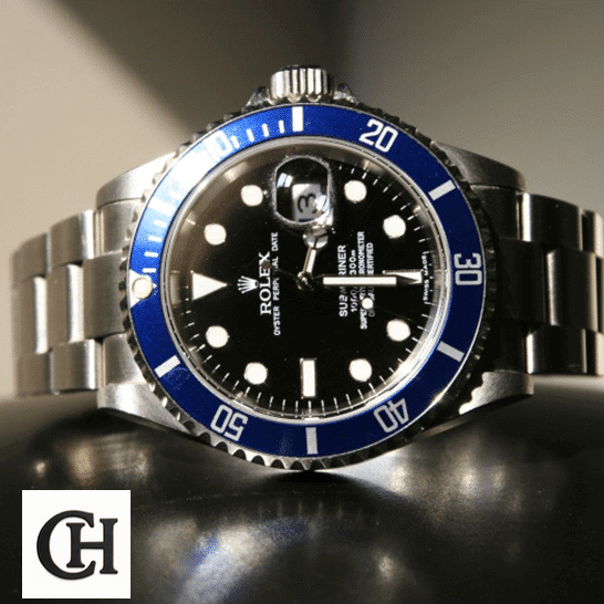 Rolex Submariner Date 16610 Black Dial Oyster on the table
