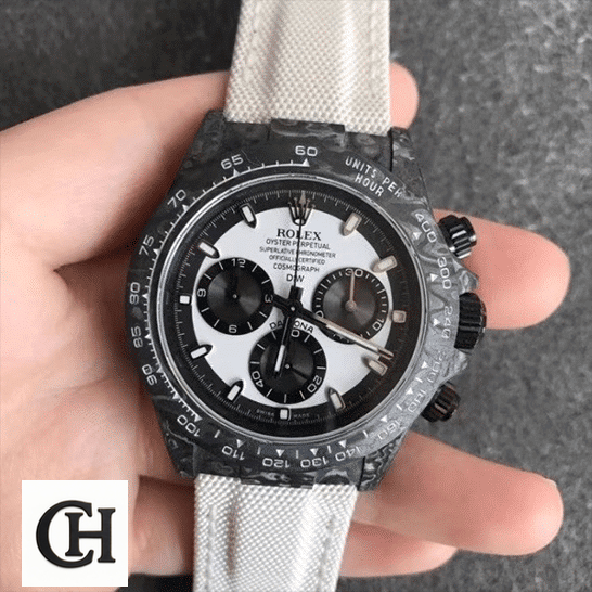 Rolex Cosmograph Daytona Rolex Daytona Carbon Cream Textile Bracelet Black Bezel on his hands