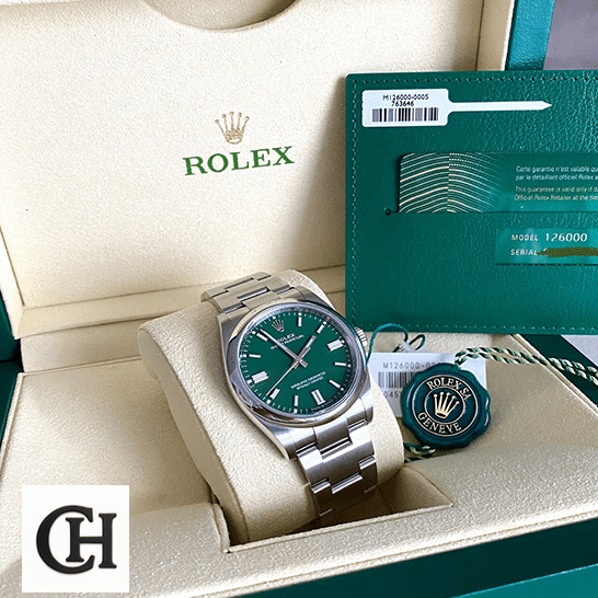 Rolex Datejust 126000 Oyster Perpetual Rolex Oyster Perpetual 126000 Green Dial & Guarantee Card in the Rolex Box