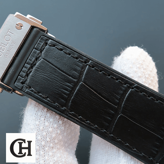 Hublot Classic Fusion Black Leather Bracelet Steel Clasp on the white glove hand