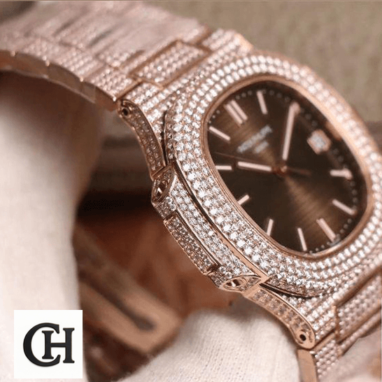 Patek Philippe Nautilus 5711 Patek Philippe 5711-R8 Nautilus Jumbo Iced Out on the white glove hand
