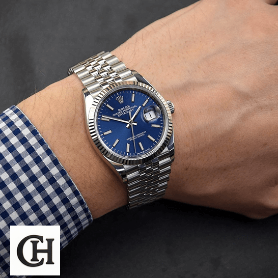 Rolex Datejust 126234 Rolex Datejust Stainless Steel Jubilee Blue Dial on the man wrist
