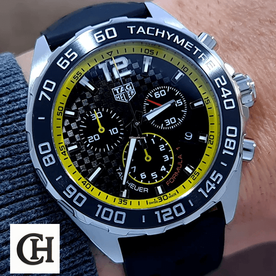 Tag Heuer Carrera Yellow Black Dial on the man wrist