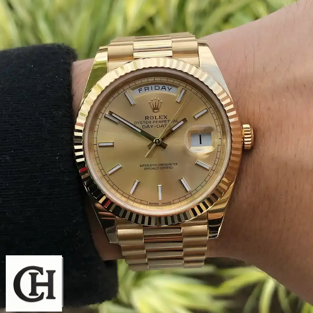 Rolex Day-Date 40 228238-0003 Champagne Dial Stick Indices on his arm