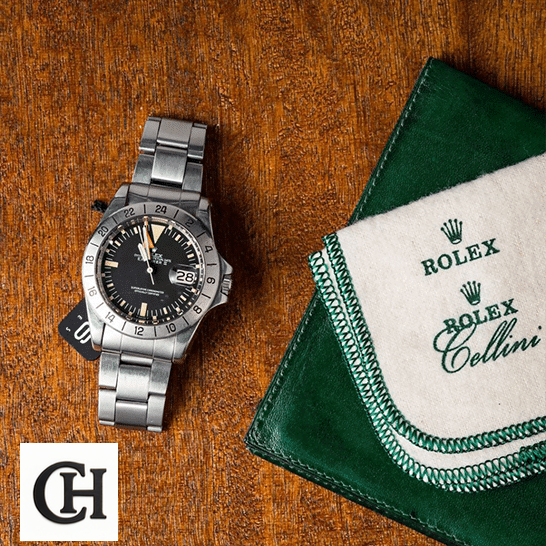 Rolex Explorer II 1655 "Steve McQueen" Vintage Handcrafted Rolex Explorer II 1655 (Antique) WARO025 Oyster Bracelet on the table