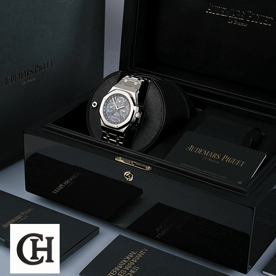 Audemars Piguet Royal Oak Offshore 26574ST.OO.1220ST.02 "Blue Dial" audemarspiguet royaloak 26574ST.OO.1220ST Audemars Piguet Royal Oak Blue Dial in the box next to warranty card