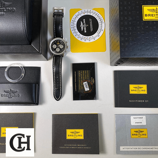 Breitling Navitimer B01 Chronograph 46 AB0127211B1X1 "Black Dial" Signature Edition Breitling Navitimer Black Dial next to warranty card