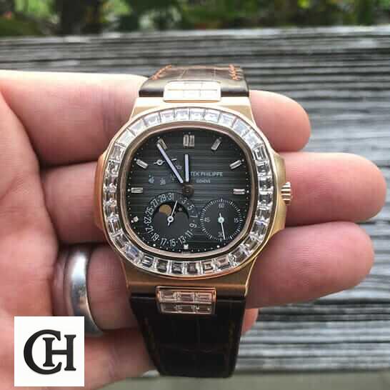 Patek Philippe Black Dial Brown Leather Bracelet on the man hand