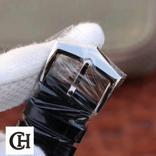 Patek Philippe Annual Calendar 5205G-013 Patek Philippe Leather Black Bracelet Steel Clasp on the whte glove hand