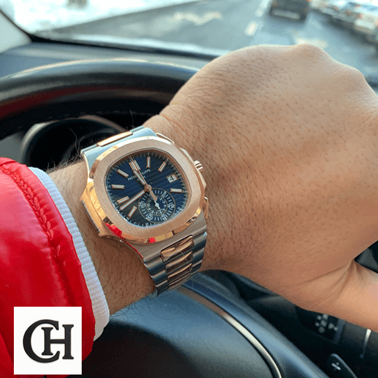 Patek Philippe Nautilus 5980/1AR-001 Patek Philippe Nautilus Blue Dial Steel Bracelet on the wrist in car