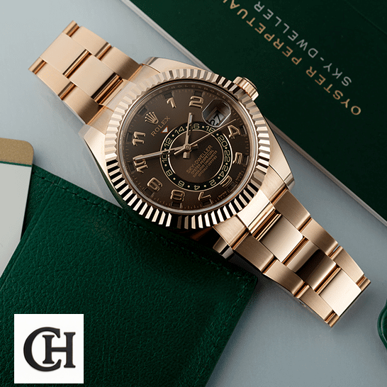 Rolex Sky-Dweller 326935 Rolex Sky-Dweller Chocolate Dial Rose Gold 326935-0003 Oyster on the table