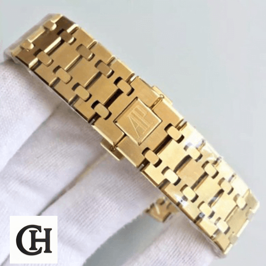 Audemars Piguet Royal Oak Chronograph 26320ST.OO.1220ST.01 Audemars Piguet 26320 Gold Bracelet closed clasp on the white glove hand