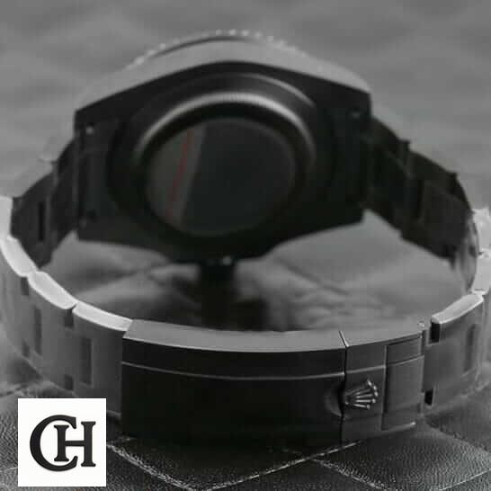 Rolex Submariner Blaken 116611N Rolex Blaken Submariner Oyster Bracelet and Clasp on the Black Table
