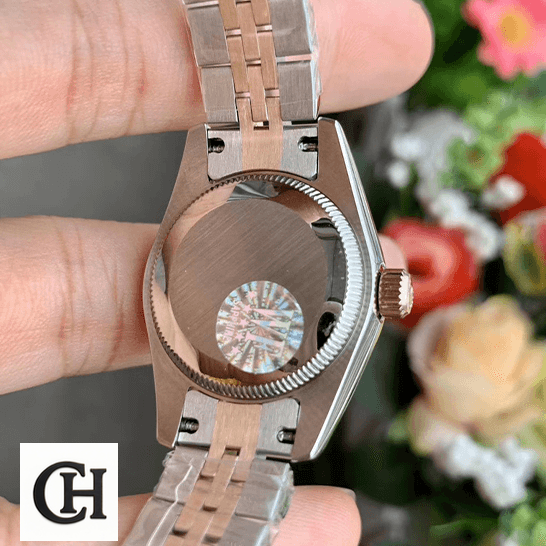 Rolex Datejust 278271 Rolex 278271 Stainless Steel Case Jubilee on the hand & flowers