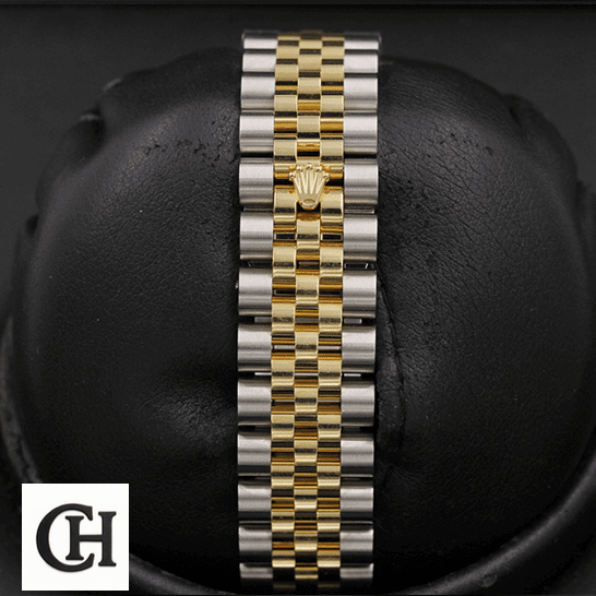Rolex Datejust 116243 Rolex Yellow Gold Stainless Steel Jubilee Bracelet on the black stand