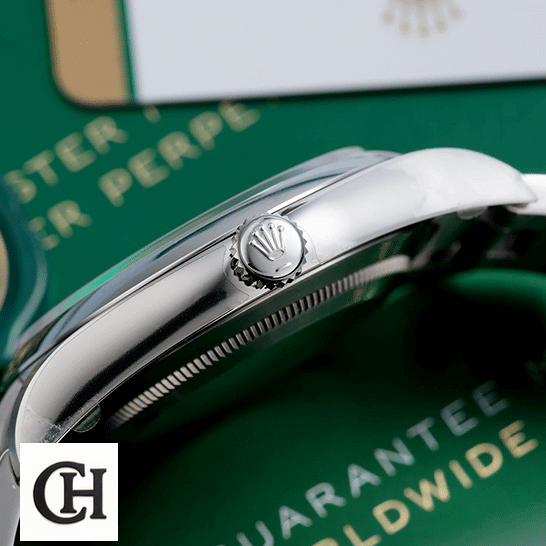 Rolex Datejust 114300 Oyster Perpetual "Steel Case" Quality Rolex Datejust Perpetual 114300 Stainless Steel Case & Crown Pusher Right Side on the table
