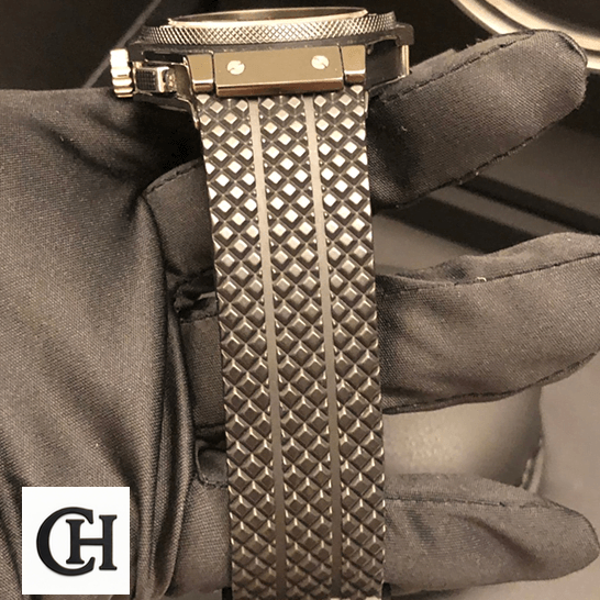 Hublot Big Bang 301.CX.130.RX "Black Magic" Top Tier hublot big bang 301.cx.130.rx bracelet 1 Hublot Big Bang 301.cx_.130.rx Black Rubber Bracelet on the black glove hand