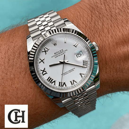 Rolex 126334 Datejust Fluted White Roman Dial on the man wrist