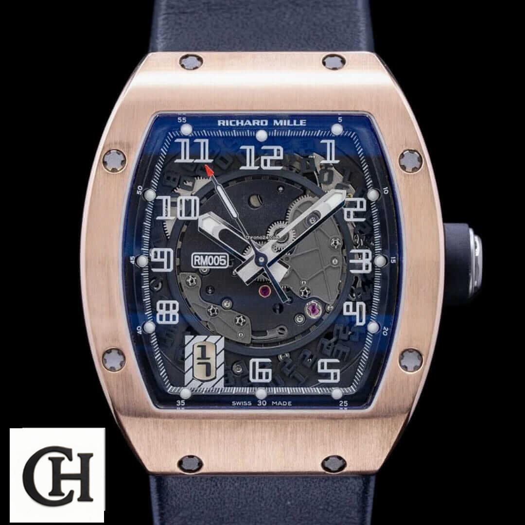 Richard Mille RM 005 Richard Mille Gold Rose Bezel Rubber Black Bracelet black background