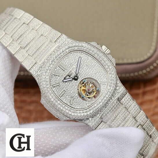 Patek Philippe Sky Moon Tourbillon 6002R Patek Philippe 6980 Tourbillion White Iced Out on the hand