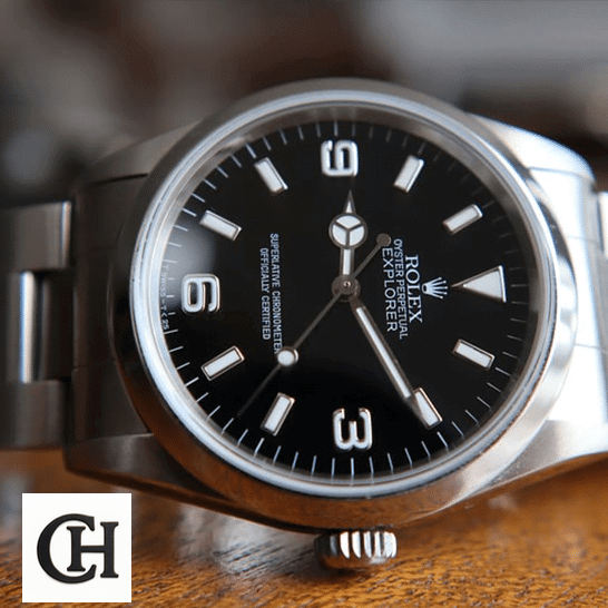 Rolex Explorer 124270 Rolex Explorer 124270 Stainless Steel Case and Bezel on a wooden table