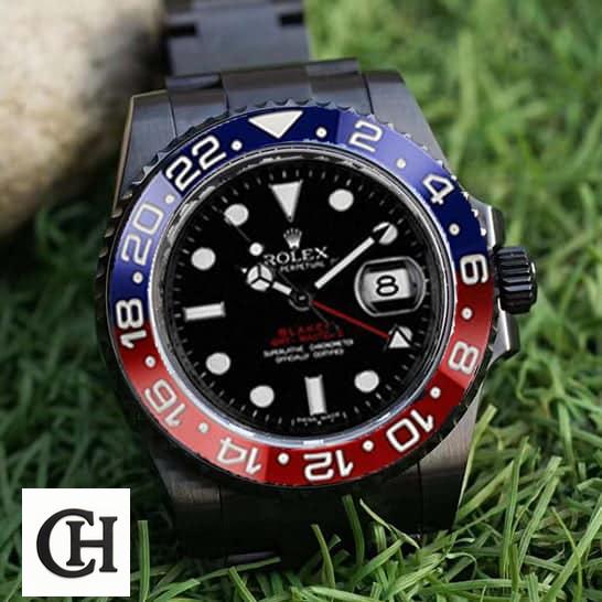 Rolex GMT-Master II 126710BLRO-0001 "Blaken Pepsi" unitedluxury rolex pepsi blaken black front Rolex Pepsi Black 126710BLRO-0001 on the grass