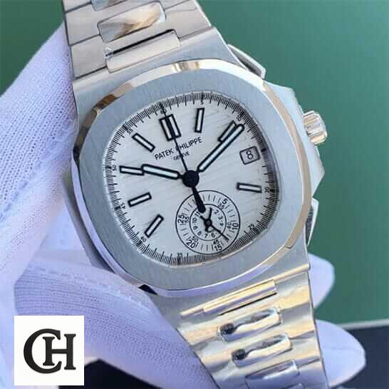 Patek Philippe Nautilus Chronograph 5980/1A-019 Patek Philippe Geneve White Dial Steel on the white glove hand