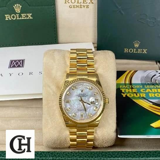 Rolex Day-Date 128238 "Mother of Pearl" rolex 128238 yellow gold 6 Rolex Day Date Mop 128238 warranty card and instruction manual