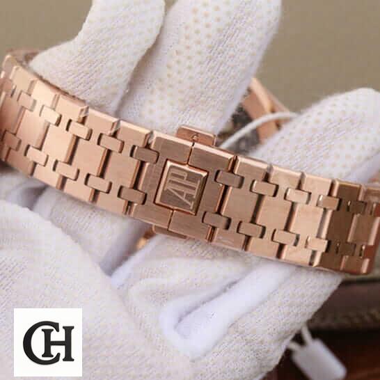 Audemars Piguet Rose Gold Bracelet on the white glove hand