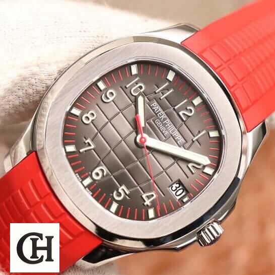 Patek Philippe Aquanaut 5167A "Red Dial" Exceptional 1 200301204202 Patek Philippe Geneve Brown Dial Red Rubber Bracelet on the hand