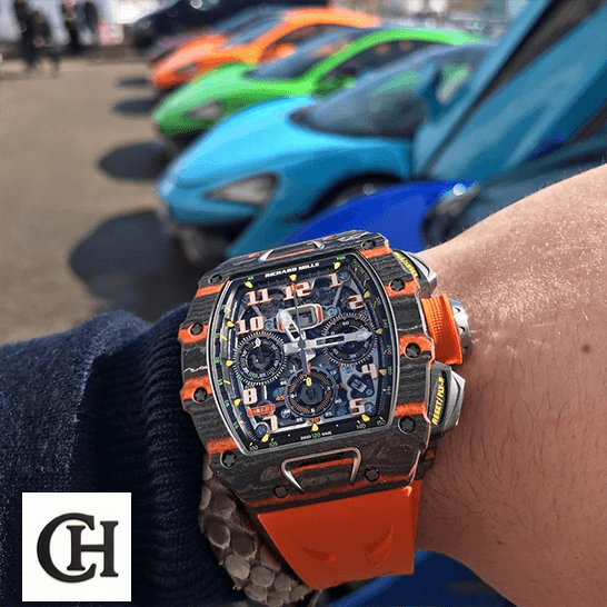 Richard Mille Mclaren hand Orange Rubber Bracelet cars background