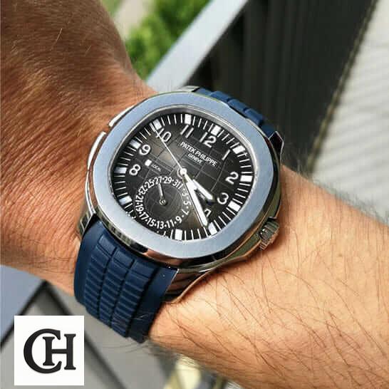 Patek Philippe Aquanaut Travel Time 5164A-001 "Dual Time" Supreme patek dual time 4 Patek Philippe Black Rubber Bracelet Steel Black Dial on the wrist