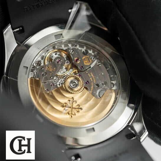 Patek Philippe Aquanaut Travel Time 5164A-001 "Dual Time" Supreme patek dual time 5 1 Patek Philippe Dual Time Stainless Steel Mechanism upside view