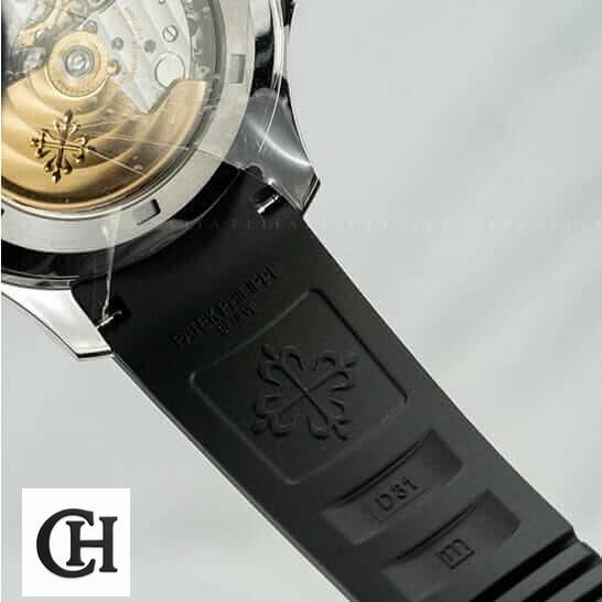 Patek Philippe Aquanaut Travel Time 5164A-001 "Dual Time" Supreme patek dual time 6 Patek Philippe Black Rubber Bracelet Steel Bezel white background