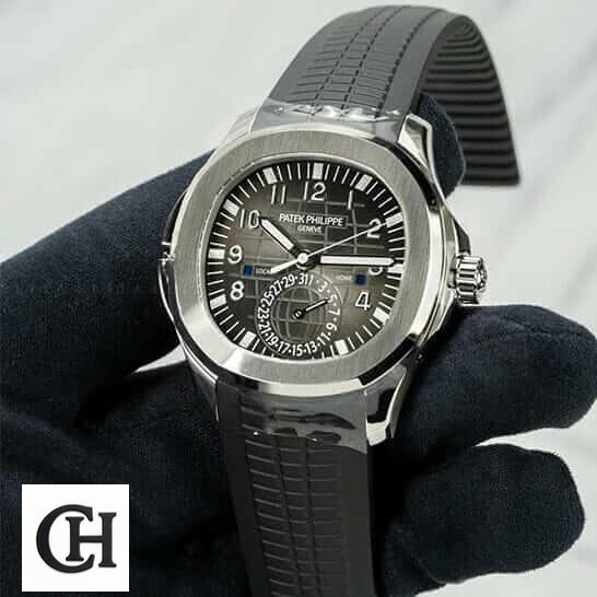 Patek Philippe Aquanaut Travel Time 5164A-001 "Dual Time" Supreme patek dual time Patek Philippe Black Dial Steel Bezel on the black glove hand