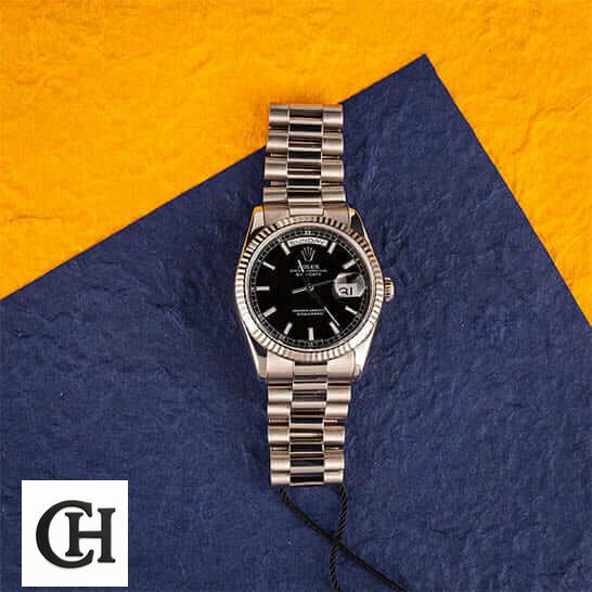 Rolex Day-Date 228238 Rolex Day-Date 118239 Orange Blue Background