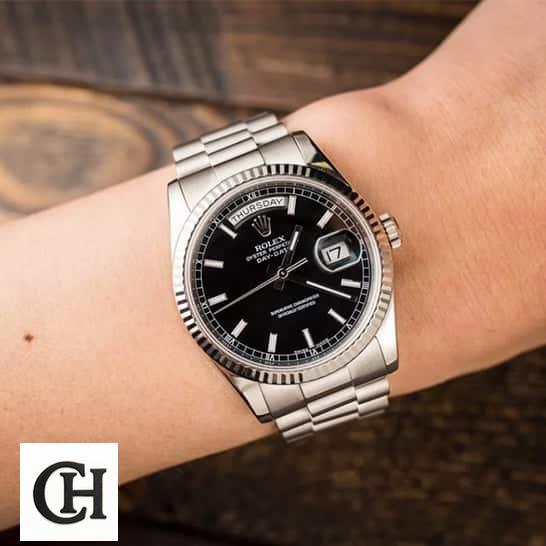 Rolex Day-Date 228238 Rolex Day-Date 118239 Stainless Steel bracelet on his arm